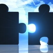 World Business teamwork puzzle pieces HBJmerger acquisition image