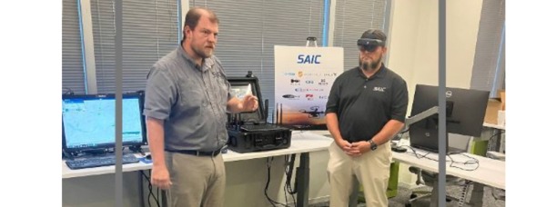 Engineers Jeremy Davidson and Eric Frazier demonstrate SAIC's Counter Unmanned Aerial System (CUAS) at the company's Innovation Factory in Huntsville