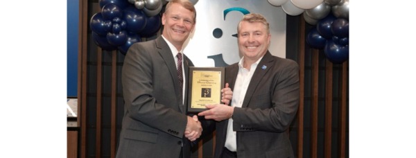 Huntsville Madison County Chamber Past Chair Jeff Gronberg presented i3 CEO Rich Kretzschmar with a plaque commemorating the Grand Opening and Ribbon Cutting of the new i3 headquarters.